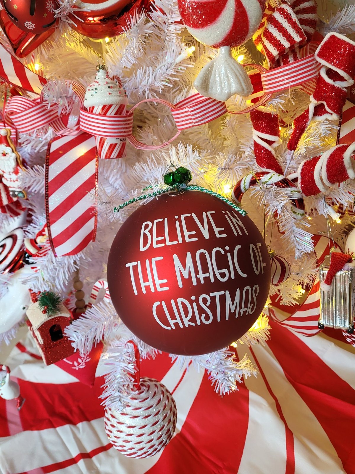 Believe in the Magic of Christmas ornament on a candy cane tree